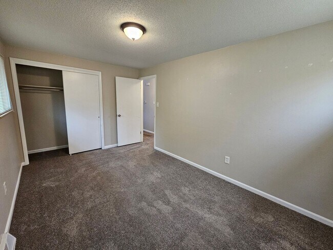 Building Photo - Welcome home to this maintained 4-bedroom, 2-bath Home in 80909!