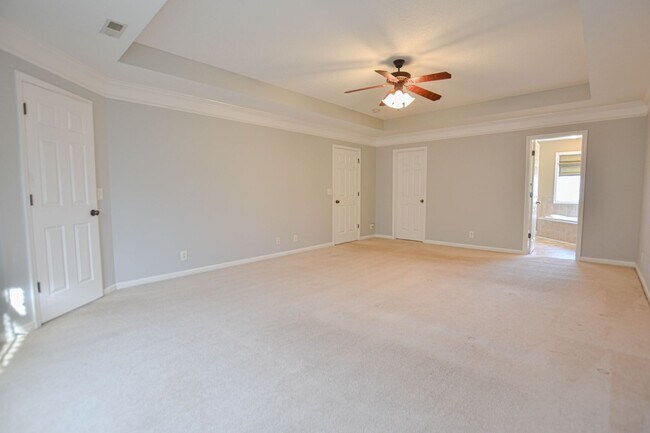 Building Photo - Pet Friendly Three Bedroom with Bonus!