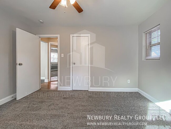 Building Photo - Modern One-Bedroom Apartment in Port Vue: ...