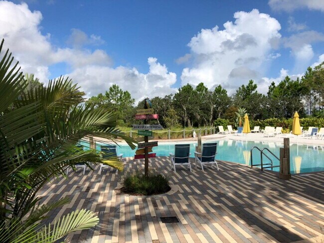 Building Photo - Welcome home to this gorgeous 4 bed 4 bath pool home!