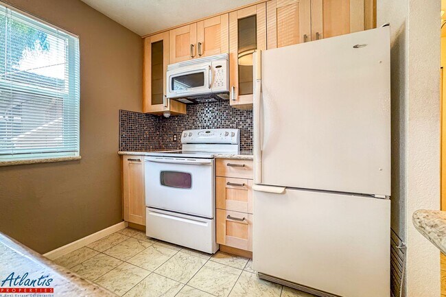 Building Photo - Pebble Creek | Lovely Condo | Prime Location