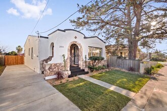 Building Photo - Beautifully Updated Spanish-Style Home Featuring an En Suite Master and Redwood Deck