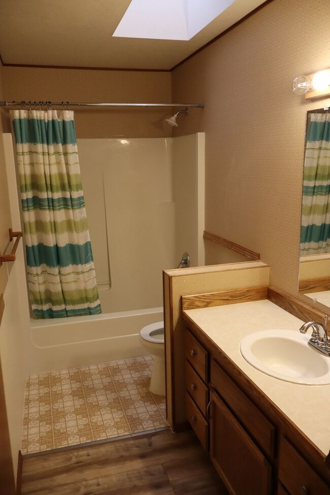 Building Photo - Spacious Home with Large pet friendly yard