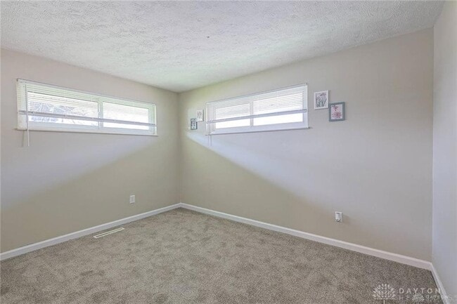 Building Photo - 5595 Shady Oak St
