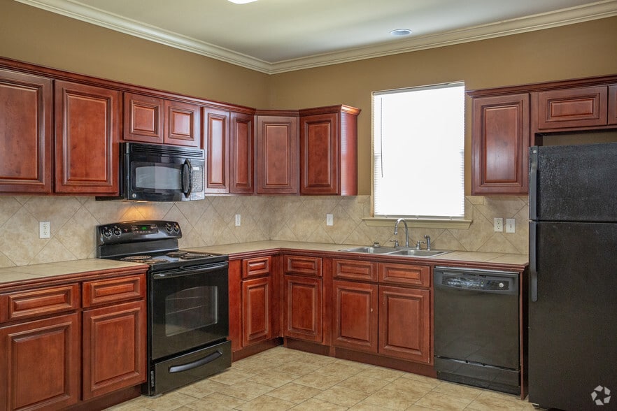 2BR, 2.5BA - 1378 SF - Juban Courts Condos