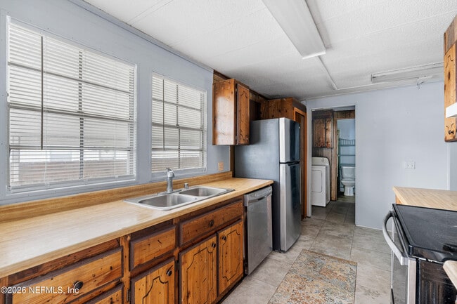 Building Photo - 7631 Timberwood Dr