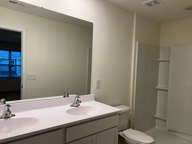 Building Photo - Beautiful New Construction 3 bedroom 2.5 Condo   with garage- Water, trash & sewer incuded!