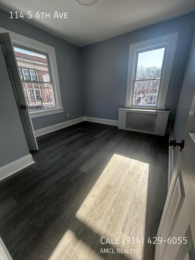 Building Photo - 114 S 6th Ave