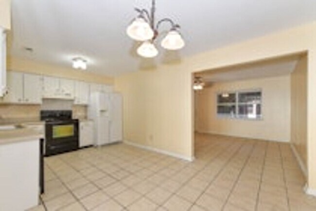 Building Photo - Pet Friendly - Fully Fenced in Yard with Two Storage Buildings