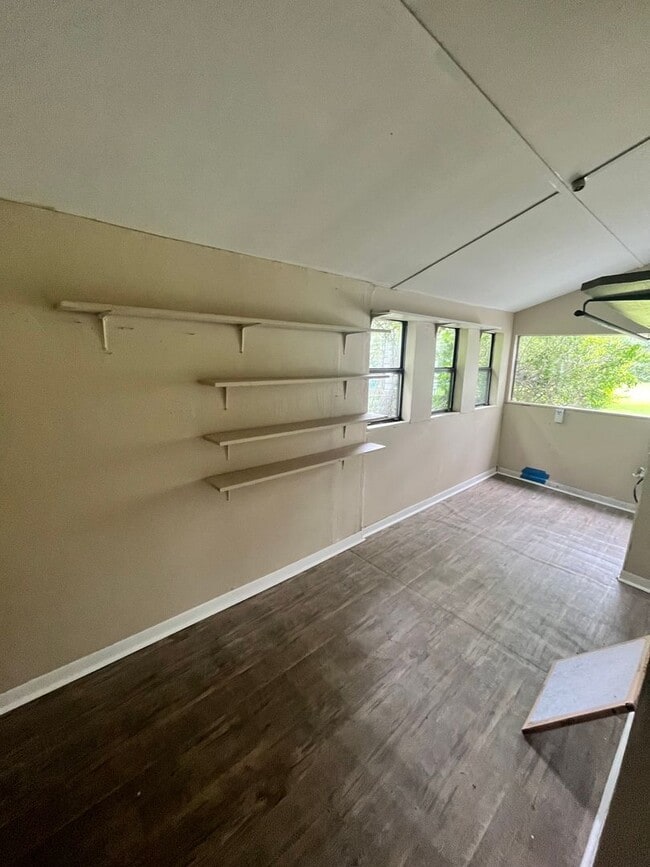 Building Photo - Beautiful 3/2 Farmhouse on Acreage with Ho...