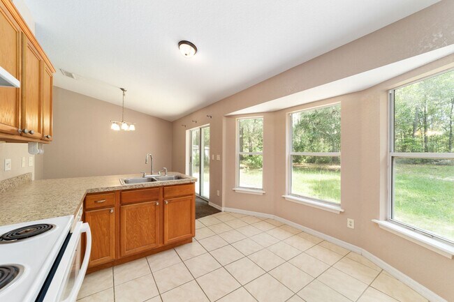 Building Photo - Peaceful 3-Bedroom Home with Open Floor Plan & Two-Car Garage in Rainbow Lakes Estates!
