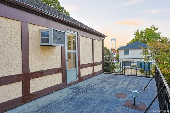 Building Photo - 145-53 7th Ave