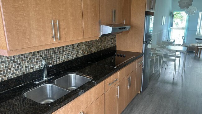 Building Photo - 6498 Collins Ave