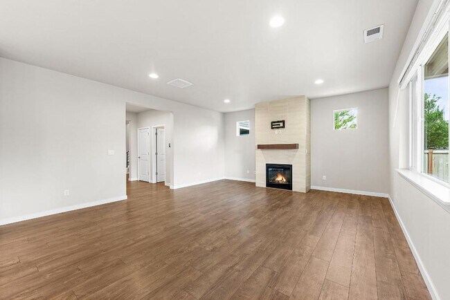 Building Photo - Modern 4-Bedroom Yelm Home with Covered Patio, Outdoor Fireplace & Office/Flex Space!