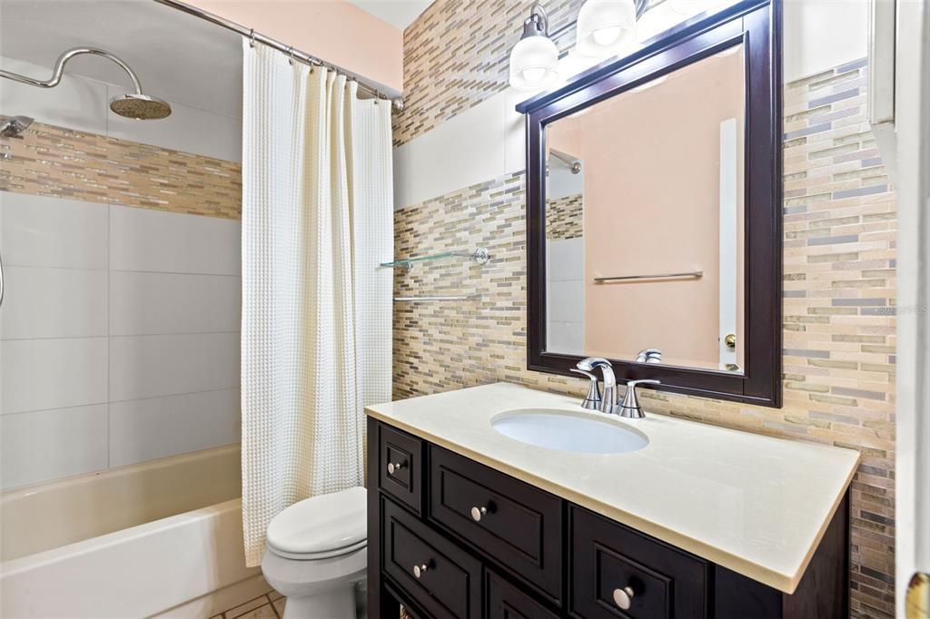 designer tile & sinks - 6396 27th St N