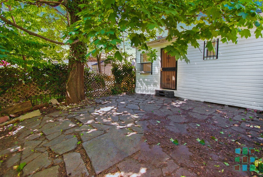 Backyard (patio area pictured) - 131 Hall Street