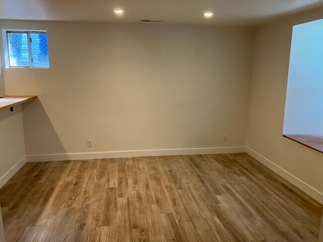 Living Room with Window Nook - 1109 1st Ave N