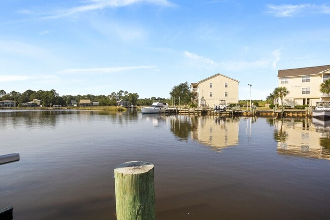 Building Photo - Welcome to Harbor Landing Condominiums — where coastal living meets convenience!