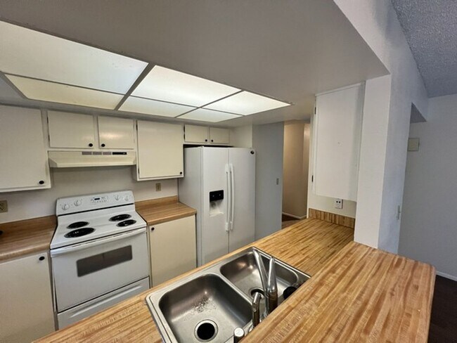 Building Photo - Updated Two Bedroom Sparks Condo in Gated Community