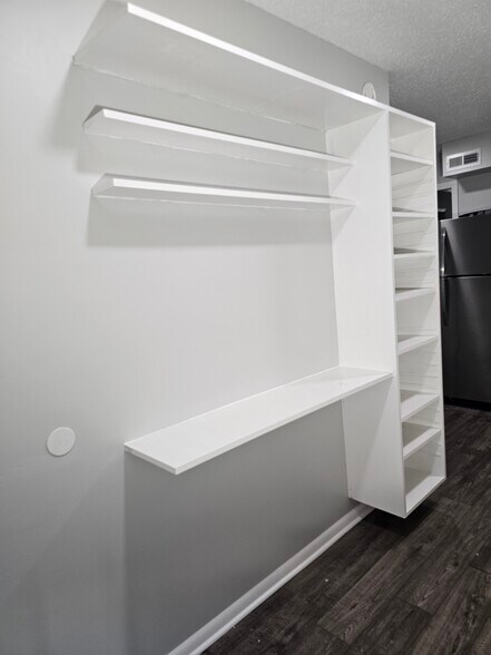 The table-height shelf even doubles as a convenient breakfast nook for quick morning meals. - 8582 Chesapeake Blvd