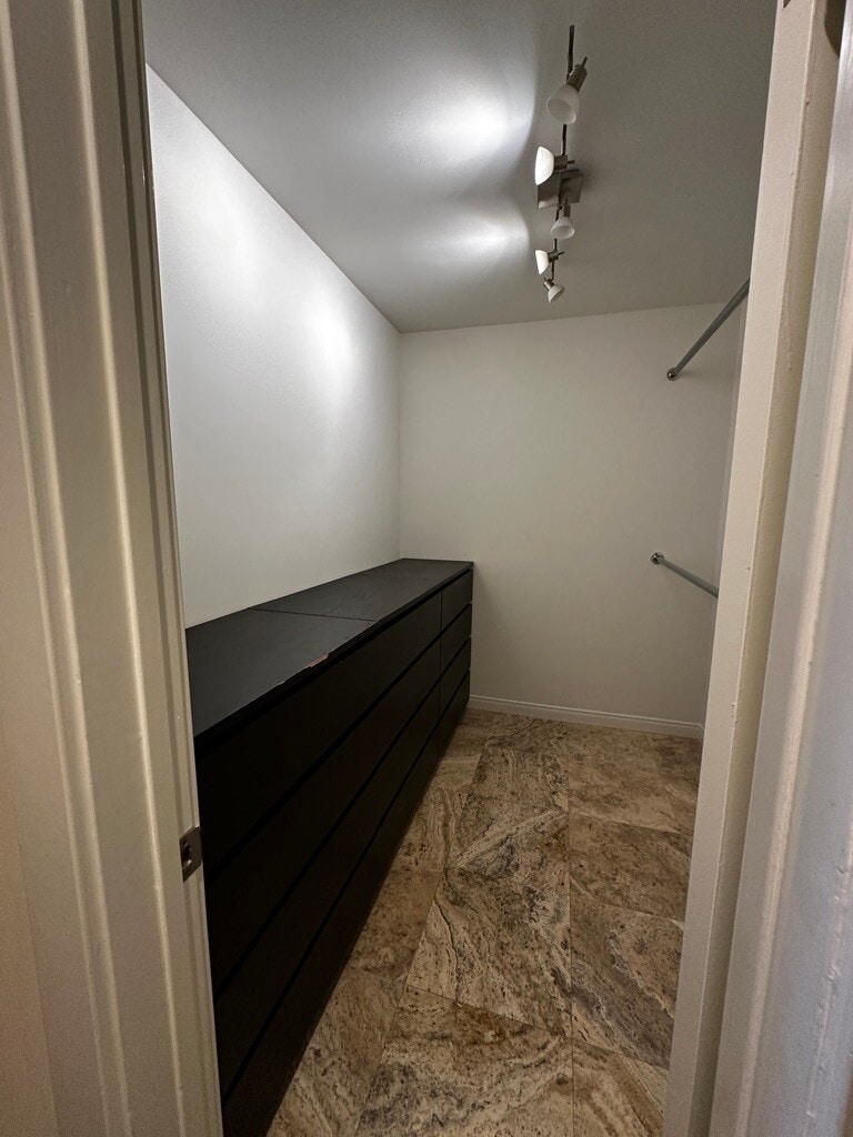 Walk-in closet w/ integrated drawers - 11951 Mayfield Ave