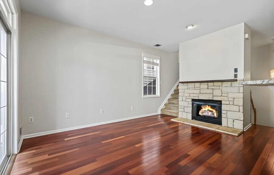 Living room with gas fireplace - 107 Brittany Ct