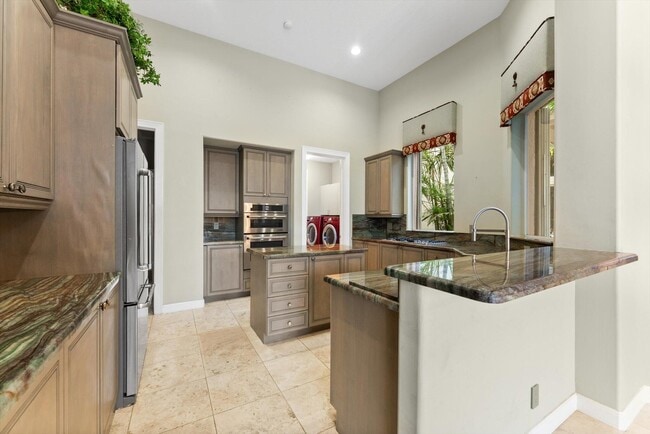 Building Photo - 7081 Mallorca Crescent