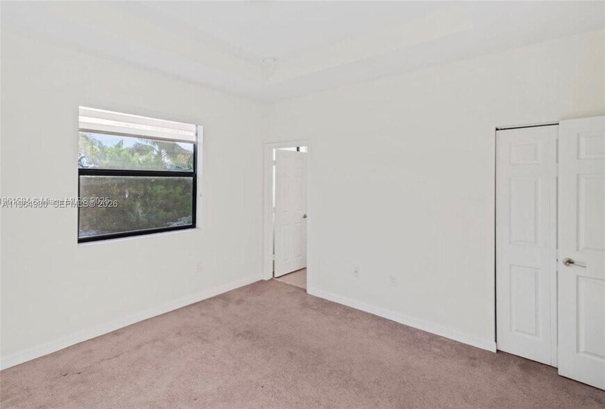 Building Photo - 11091 W 32nd Ln