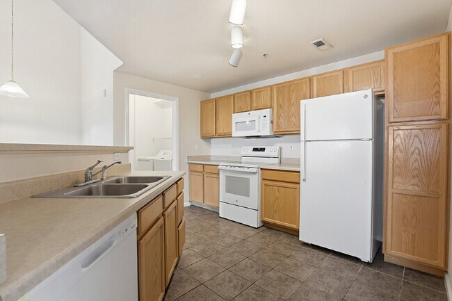 Building Photo - $1,690.95, 2-bed, 2-bath condo in a gated community with a washer/dryer.