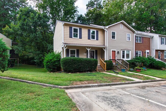 Building Photo - Rare Find: Updated and Modern End-Unit Tow...