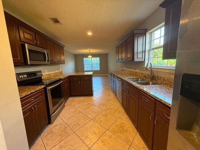 Building Photo - Gulf Breeze - Grand Ridge - 4 bedroom, 2.5...