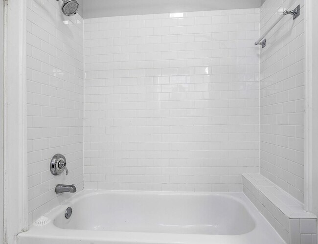 Building Photo - ADORABLE CONDO ON ARTHUR ASHE BOULEVARD