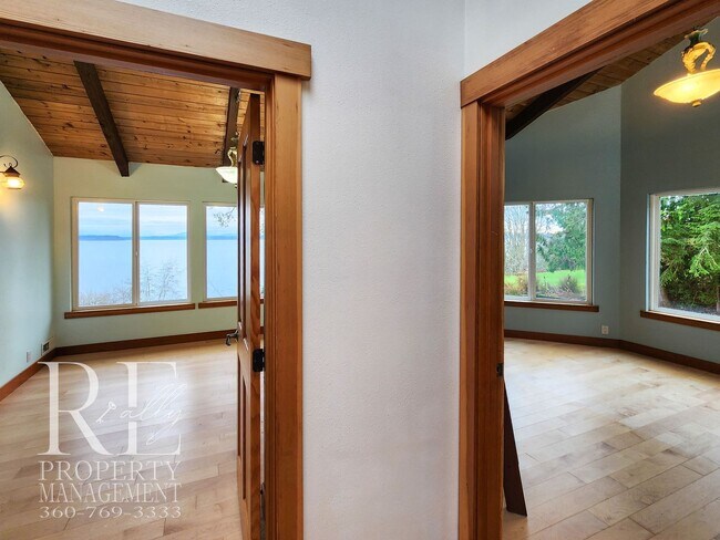Building Photo - MOVE-IN SPECIAL: 50% OFF FIRST MONTHS RENT - Waterfront Rustic Retreat with Vaulted Ceilings, Pic...