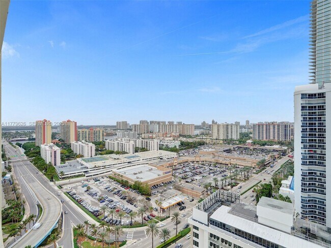 Building Photo - 16699 Collins Ave