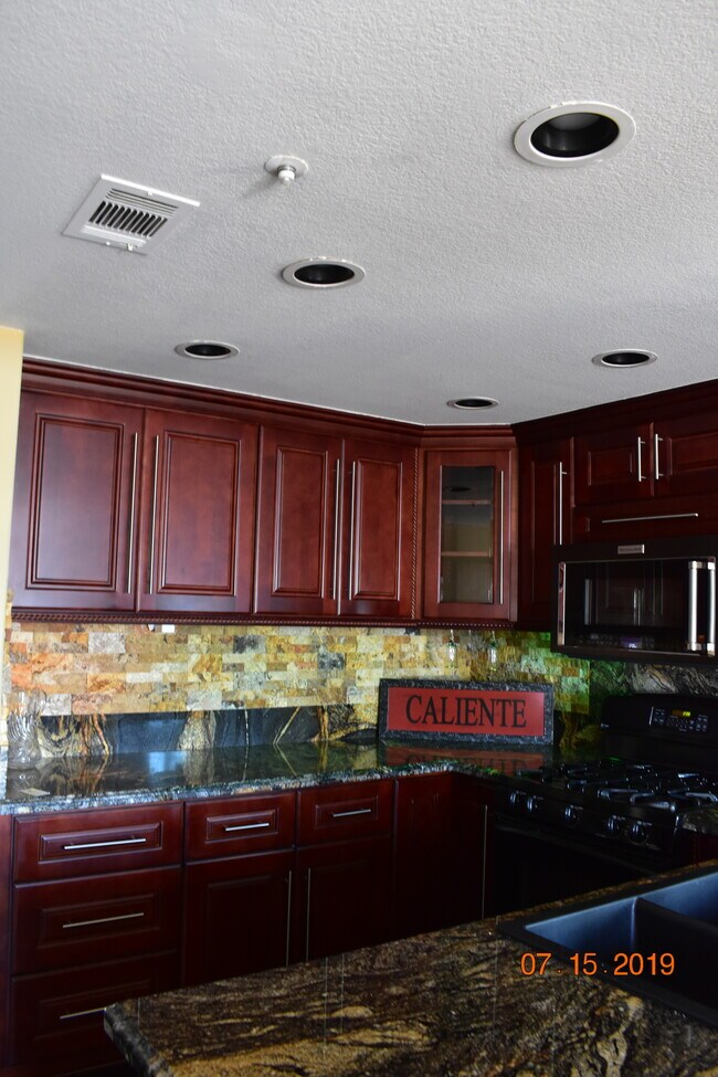 Granite & Cabinets - 703 Via Presa