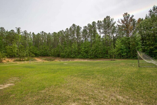 Building Photo - "Spacious 4-Bedroom Gem with 2.5 Baths at ...