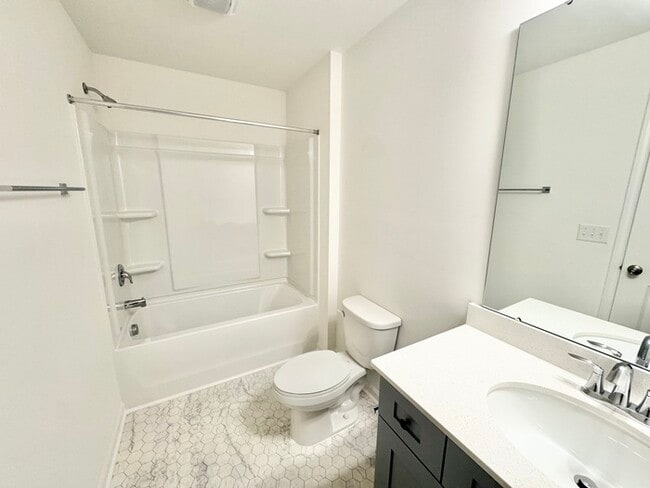 Building Photo - Four bedrooms with 2 1/2 bath with office space and loft