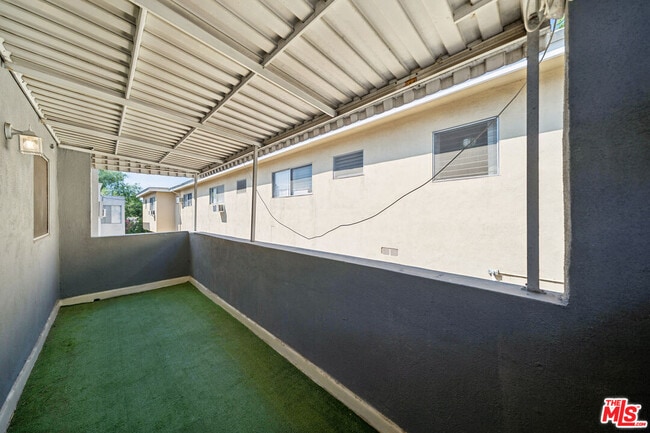 Building Photo - 1027 N Edinburgh Ave