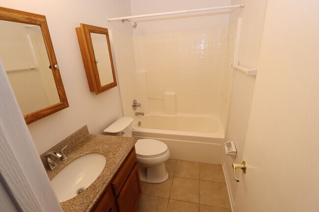 Building Photo - Discover this well-maintained 3-bedroom, 2-bath home in Indianapolis featuring an attached garage...