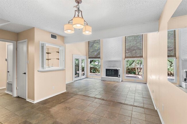 Building Photo - 8301 Greenslope Dr