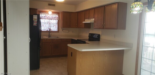 Building Photo - 15032 Woodsong Dr