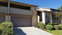 Building Photo - Available Now is a Condo style Townhouse i...