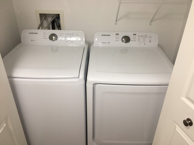 Washer and dryer located in basement - 15026 Camden Ave