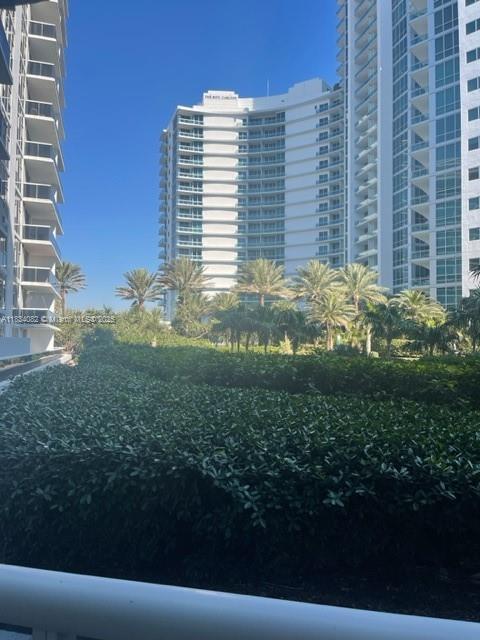Building Photo - 10275 Collins Ave