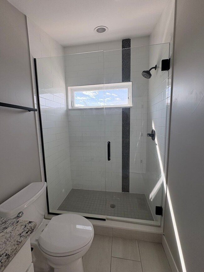 Building Photo - Modern 2 Bed + Flex Townhome with Rooftop Deck Near Paco Sanchez Park & Light Rail