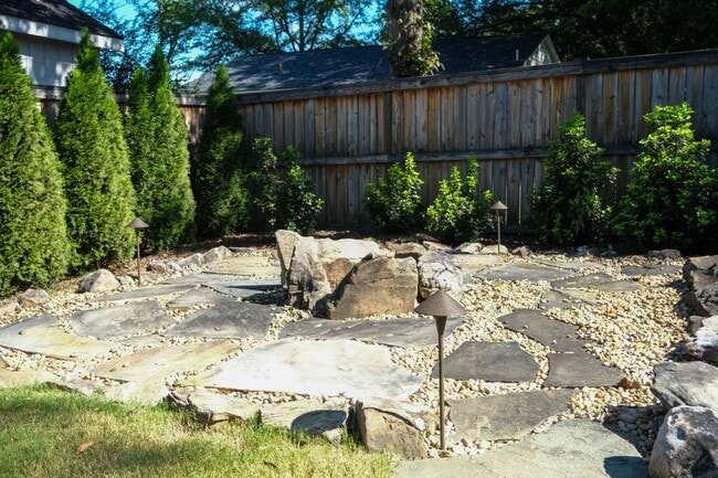 Building Photo - Like-new 3 bedroom, 2.5 bath house with an organic pond!