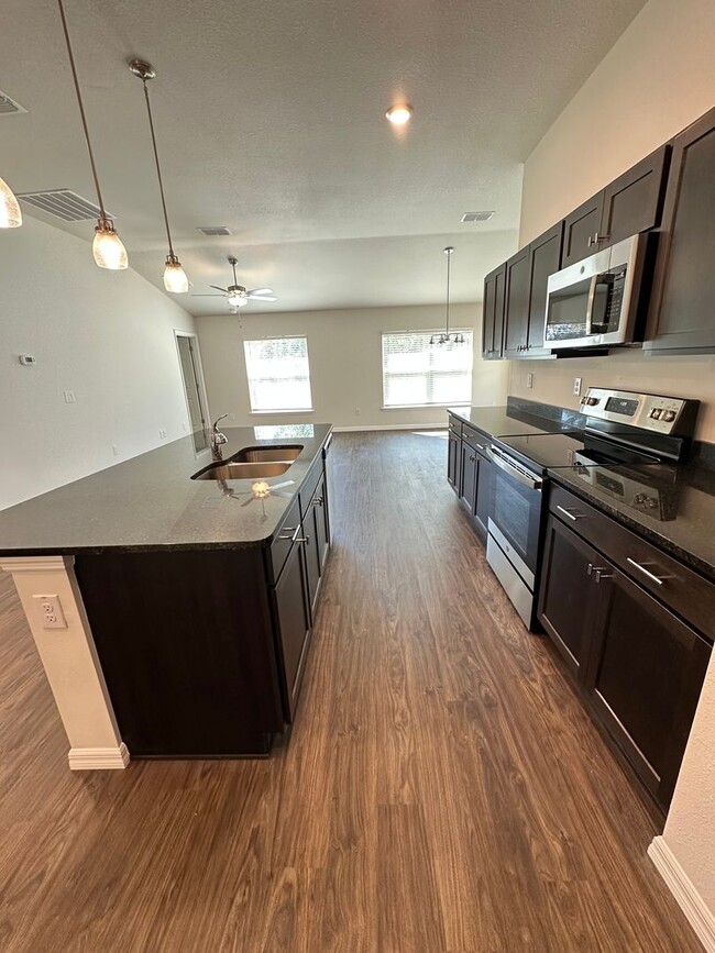 Building Photo - Brand New 4-Bedroom, 2-Bath Home with 2-Ca...