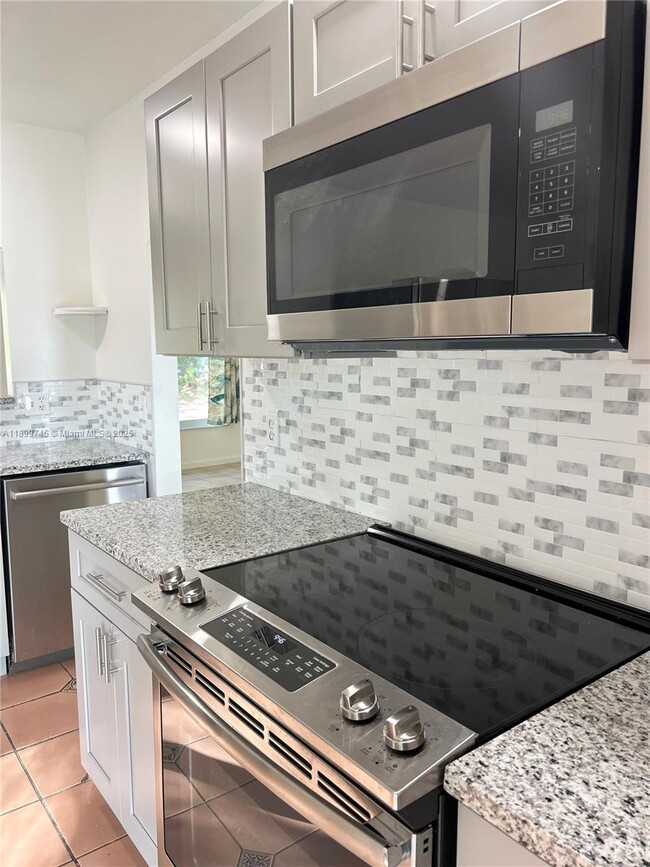 Building Photo - 6452 Royal Palm Beach Blvd