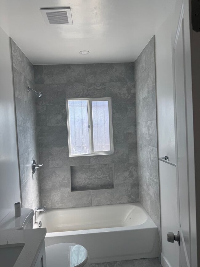 Building Photo - FOR RENT — COMPLETELY REMODELED Apartment