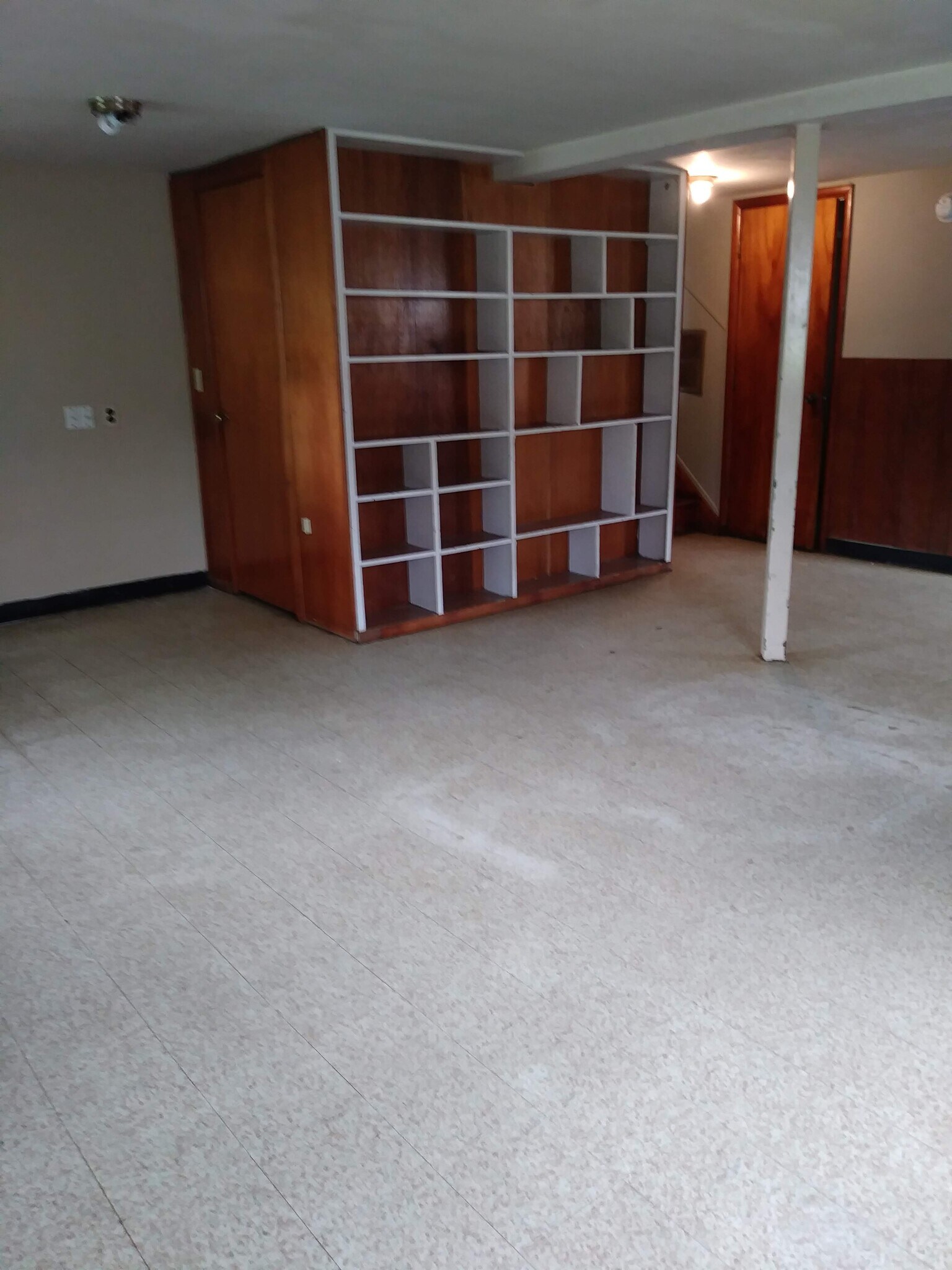 Lower Level with built in shelves and storage closet - 4113 Wooded Way